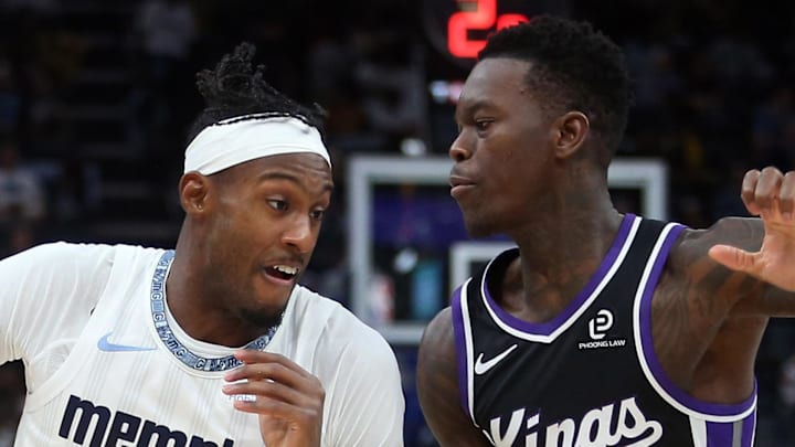 Memphis Grizzlies forward Olivier-Maxence Prosper drives to the basket as Sacramento Kings guard Dennis Schroder defends