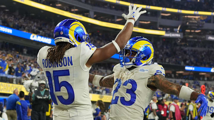 Oct 24, 2024; Inglewood, California, USA; Los Angeles Rams wide receiver Demarcus Robinson (15), running back Kyren Williams (23) and tight end Colby Parkinson (86) celebrate after a touchdown against the Minnesota Vikings in the second half at SoFi Stadium. Mandatory Credit: Kirby Lee-Imagn Images