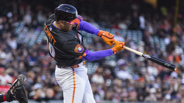 Apr 8, 2025; San Francisco, California, USA;  San Francisco Giants first baseman Casey Schmitt (10) hits a double against the Cincinnati Reds during the second inning at Oracle Park. 