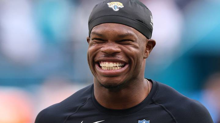 Oct 11, 2026; Tottenham, ENG;  Jacksonville Jaguars wide receiver Travis Hunter (12) warms up before the game against the Philadelphia Eagles at Tottenham Hotspur Stadium.  Mandatory Credit: Nathan Ray Seebeck-Imagn Images