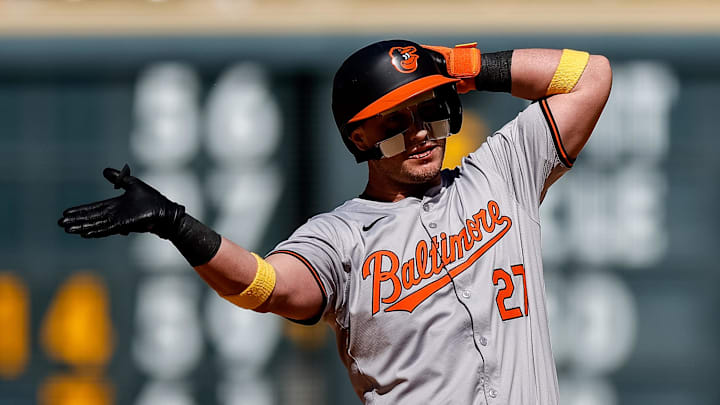 Sep 1, 2024; Denver, Colorado, USA; Baltimore Orioles catcher James McCann (27) reacts from second on a double in the ninth inning against the Colorado Rockies at Coors Field.