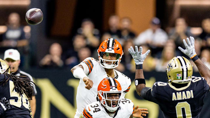 Nov 17, 2024; New Orleans, Louisiana, USA;  Cleveland Browns quarterback Jameis Winston (5) passes the ball against New Orleans Saints safety Ugo Amadi (0) during the first half at Caesars Superdome. Mandatory Credit: Stephen Lew-Imagn Images