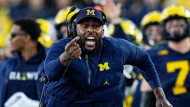 Michigan head coach Sherrone Moore challenges an incomplete pass intended for tight end Colston Loveland (not pictured) during the second half against Oregon at Michigan Stadium in Ann Arbor on Saturday, Nov. 2, 2024. Moore lost the challenge.