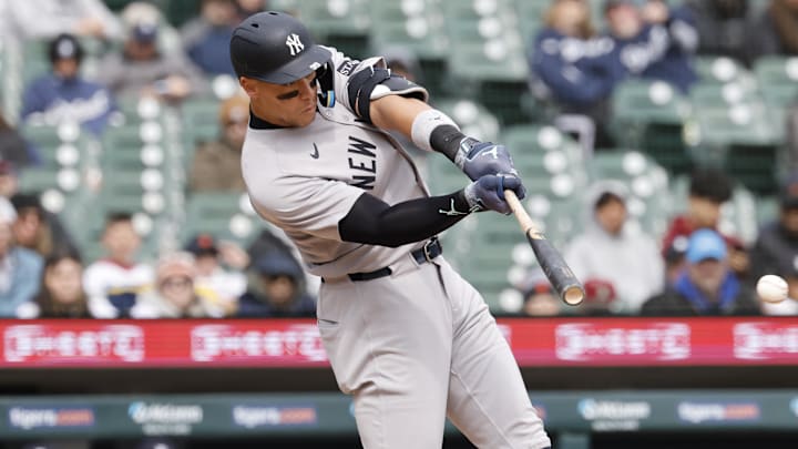 Apr 9, 2025; Detroit, Michigan, USA;  New York Yankees outfielder Aaron Judge (99) hits a two run single in the ninth inning against the Detroit Tigers at Comerica Park. 
