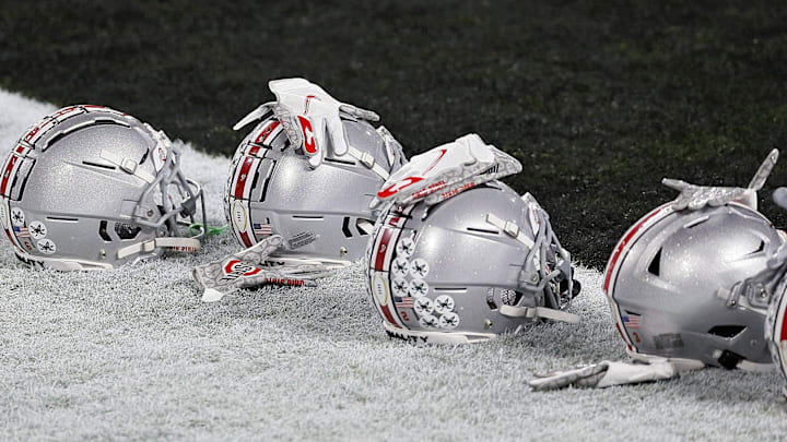 Jan. 11, 2021; Miami Gardens, Florida, USA; Ohio State Buckeye helmets along the end zone during warm-ups before the College Football Playoff National Championship between the Alabama Crimson Tide and the Ohio State Buckeyes at Hard Rock Stadium in Miami Gardens, Fla. on January 11, 2021. Jan. 11, 2021; Miami Gardens, Florida, USA; Ohio State Buckeye helmets along the end zone during warm-ups before the College Football Playoff National Championship between the Alabama Crimson Tide and the Ohio State Buckeyes at Hard Rock Stadium in Miami Gardens, Fla. on January 11, 2021.