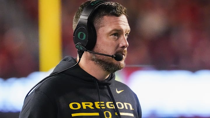 Nov 16, 2024; Madison, Wisconsin, USA;  Oregon Ducks head coach Dan Lanning looks on during the first quarter against the Wisconsin Badgers at Camp Randall Stadium. 