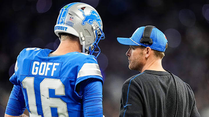 Detroit Lions quarterback Jared Goff (16) talks to offensive coordinator Ben Johnson. Detroit Lions quarterback Jared Goff (16) talks to offensive coordinator Ben Johnson.