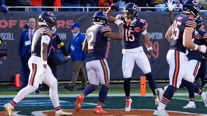 Rome Odunze celebrates with teammates after a touchdown earlier this season. Rome Odunze celebrates with teammates after a touchdown earlier this season.