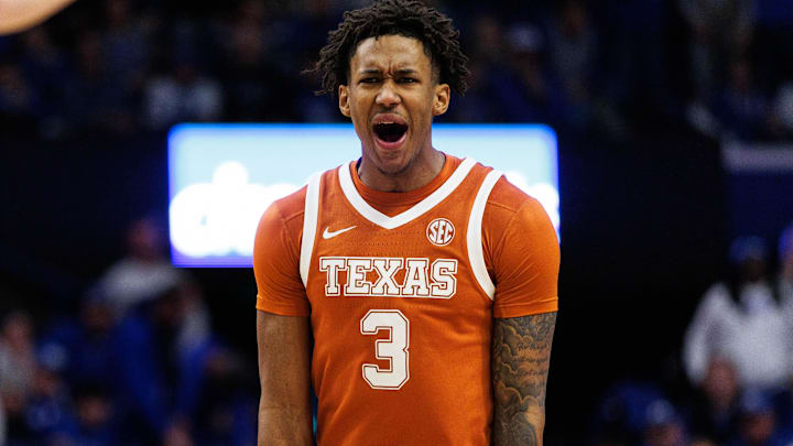 Texas Longhorns forward Dailyn Swain (3) celebrates after center Matas Vokietaitis (8) scores a basket during the first half against the Kentucky Wildcats at Rupp Arena at Central Bank Center.