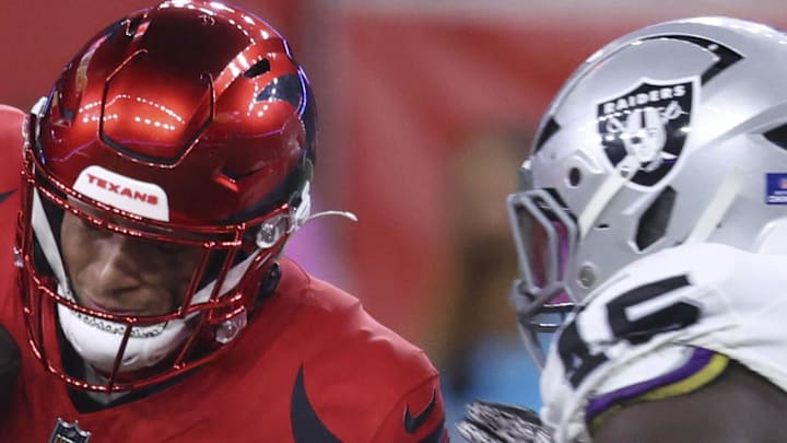 Dec 21, 2025; Houston, Texas, USA; Houston Texans wide receiver Jayden Higgins (81) makes a reception as Las Vegas Raiders linebacker Devin White (45) defends during the fourth quarter at NRG Stadium. Mandatory Credit: Troy Taormina-Imagn Images