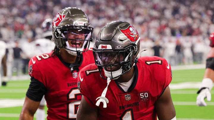 Tampa Bay Buccaneers running back Rachaad White (1) celebrates after scoring a touchdown during the fourth quarter.
