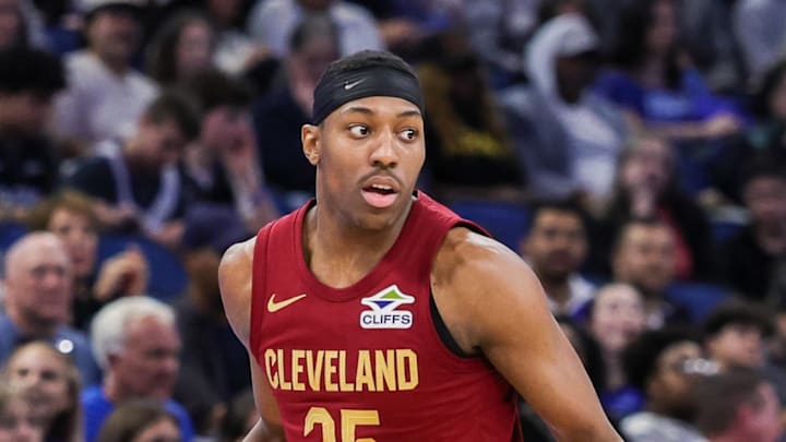 Cleveland Cavaliers forward Nae'qwan Tomlin brings the ball up court during the second half against the Orlando Magic.