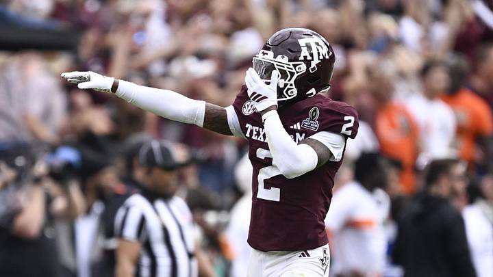 Dec 20, 2025; College Station, TX, USA; Texas A&M Aggies cornerback Dezz Ricks (2) celebrates after Miami Hurricanes miss a field goal during first half of the first round game of the CFP National Playoff at Kyle Field. Mandatory Credit: Jerome Miron-Imagn Images Dec 20, 2025; College Station, TX, USA; Texas A&M Aggies cornerback Dezz Ricks (2) celebrates after Miami Hurricanes miss a field goal during first half of the first round game of the CFP National Playoff at Kyle Field. Mandatory Credit: Jerome Miron-Imagn Images