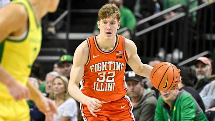 Illinois guard Kasparas Jakucionis (32) dribbles against Oregon at Matthew Knight Arena. Illinois guard Kasparas Jakucionis (32) dribbles against Oregon at Matthew Knight Arena.