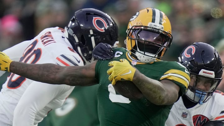 Green Bay Packers running back Josh Jacobs (8) runs for a first down against the Chicago Bears two weeks ago. Green Bay Packers running back Josh Jacobs (8) runs for a first down against the Chicago Bears two weeks ago.