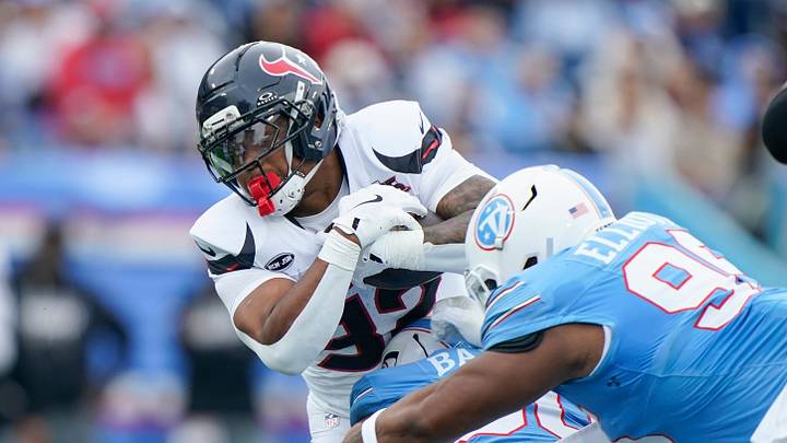 Houston Texans running back David Montgomery (32) is tackled by Tennessee Titans linebacker Cody Barton (50) Houston Texans running back David Montgomery (32) is tackled by Tennessee Titans linebacker Cody Barton (50)