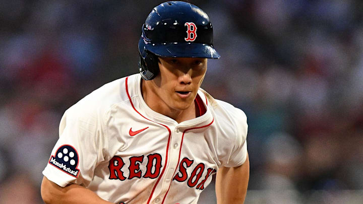  Boston Red Sox designated hitter Masataka Yoshida (7) runs to third base during the fourth inning of a game against the Colorado Rockies at Fenway Park.