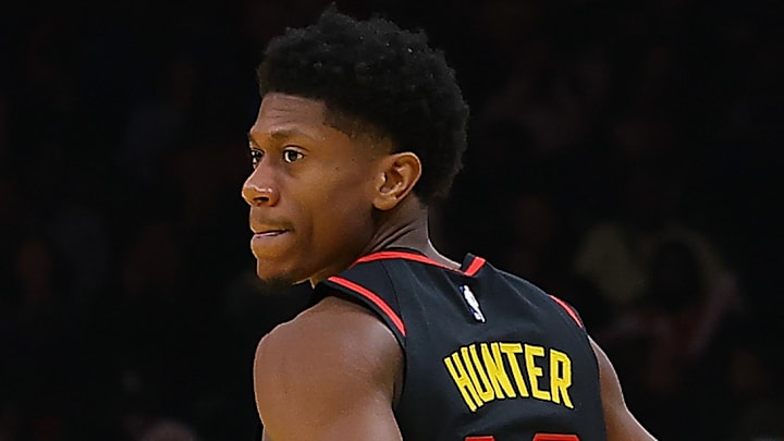 De'Andre Hunter #12 of the Atlanta Hawks reacts after a basket against the Cleveland Cavaliers.