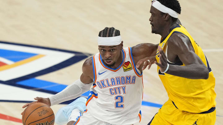 Jun 5, 2025; Oklahoma City, Oklahoma, USA; Oklahoma City Thunder guard Shai Gilgeous-Alexander (2) dribbles the ball against Indiana Pacers forward Pascal Siakam (43) during the first quarter in game one of the 2025 NBA Finals at Paycom Center. Mandatory Credit: Kyle Terada-Imagn Images