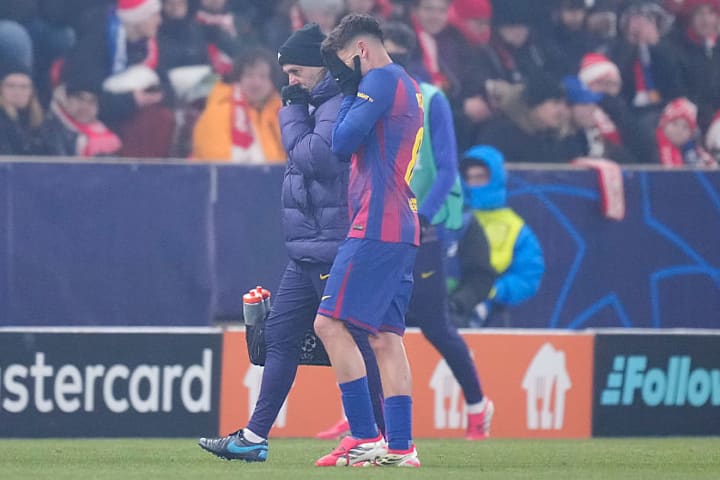 Pedri exiting the field following his injury setback.