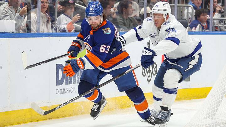 Oct 10, 2026; Elmont, New York, USA; New York Islanders left wing Matias MacCelli (63) and Tampa Bay Lightning defenseman John Carlson (74) battle for control of the puck in the second period at UBS Arena. Mandatory Credit: Wendell Cruz-Imagn Images Oct 10, 2026; Elmont, New York, USA; New York Islanders left wing Matias MacCelli (63) and Tampa Bay Lightning defenseman John Carlson (74) battle for control of the puck in the second period at UBS Arena. Mandatory Credit: Wendell Cruz-Imagn Images