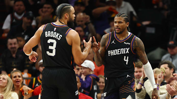 Apr 27, 2026; Phoenix, Arizona, USA; Phoenix Suns guard Jalen Green (4) celebrates a shot with forward Dillon Brooks (3) against the Oklahoma City Thunder in the first half during game four of the first round of the 2026 NBA Playoffs at Mortgage Matchup Center. Mandatory Credit: Mark J. Rebilas-Imagn Images