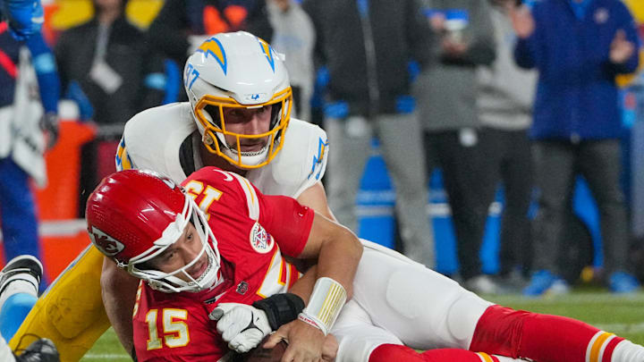 Kansas City Chiefs quarterback Patrick Mahomes (15) is sacked by Los Angeles Chargers linebacker Joey Bosa (97) 