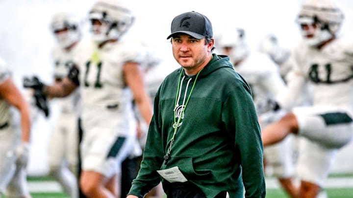 Michigan State football head coach Jonathan Smith looks on during practice on Tuesday, April 8, 2025, in East Lansing. Michigan State football head coach Jonathan Smith looks on during practice on Tuesday, April 8, 2025, in East Lansing.