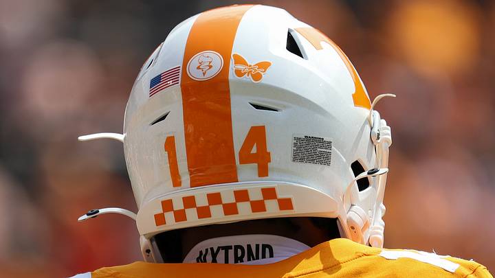 Sep 5, 2026; Knoxville, Tennessee, USA; A butterfly sticker in honor of Dolly Parton is on the helmet of Tennessee Volunteers defensive back Kayin Lee (14) before the game against the Furman Paladins at Neyland Stadium. Mandatory Credit: Randy Sartin-Imagn Images Sep 5, 2026; Knoxville, Tennessee, USA; A butterfly sticker in honor of Dolly Parton is on the helmet of Tennessee Volunteers defensive back Kayin Lee (14) before the game against the Furman Paladins at Neyland Stadium. Mandatory Credit: Randy Sartin-Imagn Images