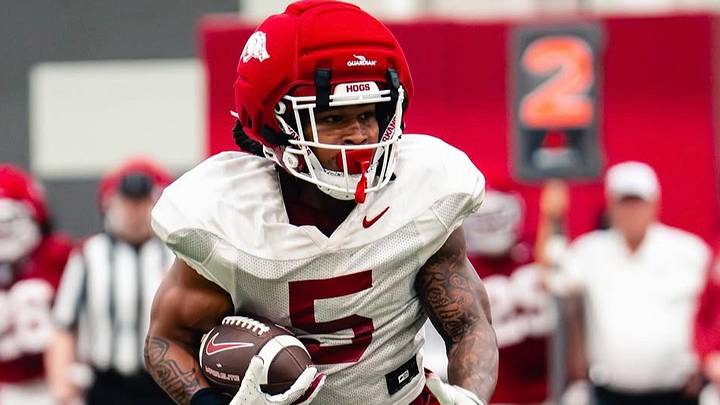 Arkansas Razorbacks running back Sutton Smith looks for running room during spring practice Arkansas Razorbacks running back Sutton Smith looks for running room during spring practice