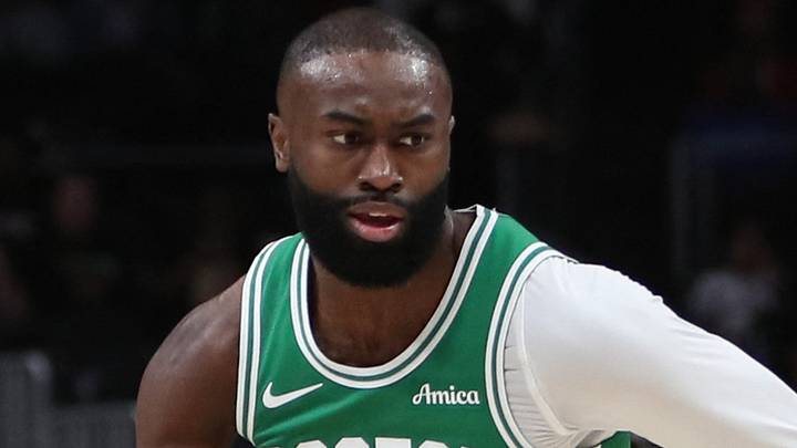 Mar 30, 2026; Atlanta, Georgia, USA; Boston Celtics guard Jaylen Brown (7) dribbles against Atlanta Hawks guard Dyson Daniels (5) in the first half at State Farm Arena. Mandatory Credit: Mady Mertens-Imagn Images
