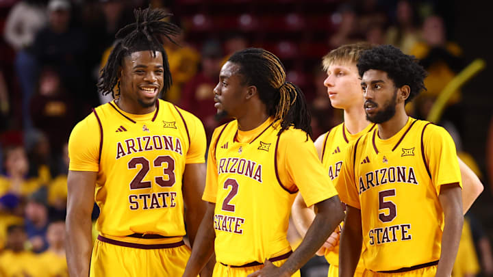 Jan 24, 2026; Tempe, Arizona, USA; Arizona State Sun Devils forward Allen Mukeba (23), guard Anthony Johnson (2) and guard Maurice Odum (5) against the Cincinnati Bearcats at Desert Financial Arena. Mandatory Credit: Mark J. Rebilas-Imagn Images