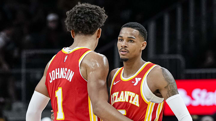 Atlanta Hawks forward Jalen Johnson and guard Dejounte Murray