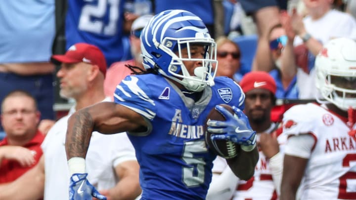 Memphis Tigers running back Sutton Smith (5) runs for a touchdown against the Arkansas Razorbacks during the second half at Simmons Bank Liberty Stadium.