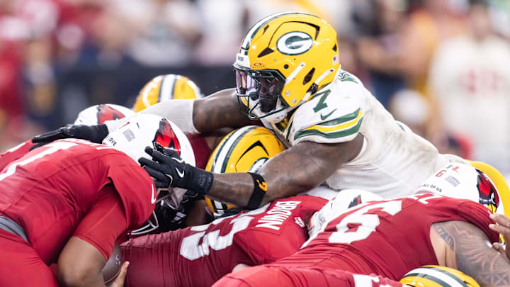 Arizona Cardinals quarterback Jacoby Brissett is stopped by Green Bay Packers linebacker Quay Walker on a fourth-and-1 sneak. Arizona Cardinals quarterback Jacoby Brissett is stopped by Green Bay Packers linebacker Quay Walker on a fourth-and-1 sneak.