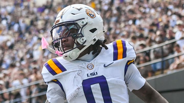 Oct 18, 2025; Nashville, Tennessee, USA; Louisiana State Tigers wide receiver Zavion Thomas (0) celebrates with his teammates after scoring a touchdown against the Vanderbilt Commodores during the second half at FirstBank Stadium. Mandatory Credit: Steve Roberts-Imagn Images Oct 18, 2025; Nashville, Tennessee, USA; Louisiana State Tigers wide receiver Zavion Thomas (0) celebrates with his teammates after scoring a touchdown against the Vanderbilt Commodores during the second half at FirstBank Stadium. Mandatory Credit: Steve Roberts-Imagn Images
