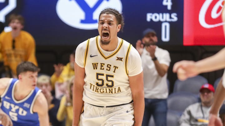 Feb 28, 2026; Morgantown, West Virginia, USA; West Virginia Mountaineers center Harlan Obioha (55) celebrates after a score during the first half against the BYU Cougars at Hope Coliseum. Mandatory Credit: Ben Queen-Imagn Images Feb 28, 2026; Morgantown, West Virginia, USA; West Virginia Mountaineers center Harlan Obioha (55) celebrates after a score during the first half against the BYU Cougars at Hope Coliseum. Mandatory Credit: Ben Queen-Imagn Images