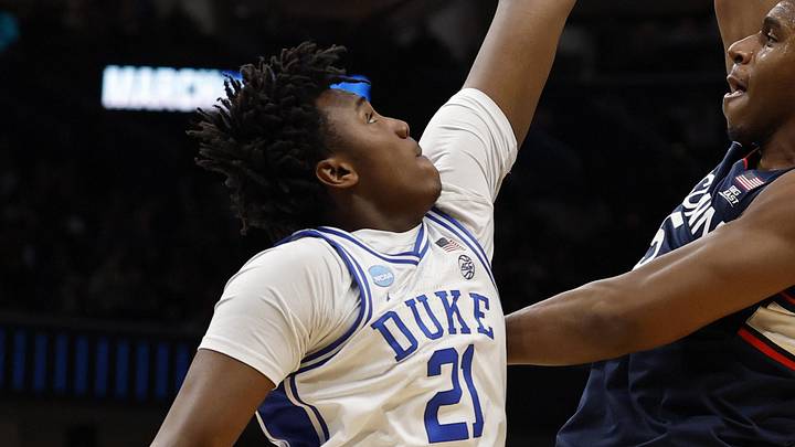 Mar 29, 2026; Washington, DC, USA; UConn Huskies forward Tarris Reed Jr. (5) shoots the ball over Duke Blue Devils center Patrick Ngongba (21) during an Elite Eight game of the East Regional of the men's 2026 NCAA Tournament at Capital One Arena. Mandatory Credit: Geoff Burke-Imagn Images Mar 29, 2026; Washington, DC, USA; UConn Huskies forward Tarris Reed Jr. (5) shoots the ball over Duke Blue Devils center Patrick Ngongba (21) during an Elite Eight game of the East Regional of the men's 2026 NCAA Tournament at Capital One Arena. Mandatory Credit: Geoff Burke-Imagn Images