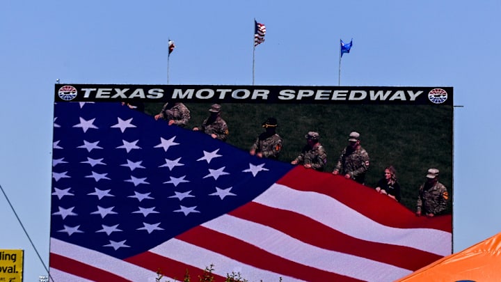 A view of a US Army Apache helicopter doing a military flyover before the start of the Wurth 400 race at Texas Motor Speedway. A view of a US Army Apache helicopter doing a military flyover before the start of the Wurth 400 race at Texas Motor Speedway.
