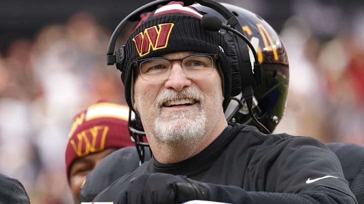 Washington Commanders head coach Dan Quinn (right) Mandatory Credit: Amber Searls-Imagn Images