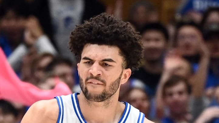 Feb 14, 2026; Durham, North Carolina, USA; Duke Blue Devils forward Cameron Boozer (12) is greeted by forward Dame Sarr (7) after scoring a basket during the first half against the Clemson Tigers at Cameron Indoor Stadium. Mandatory Credit: Rob Kinnan-Imagn Images Feb 14, 2026; Durham, North Carolina, USA; Duke Blue Devils forward Cameron Boozer (12) is greeted by forward Dame Sarr (7) after scoring a basket during the first half against the Clemson Tigers at Cameron Indoor Stadium. Mandatory Credit: Rob Kinnan-Imagn Images