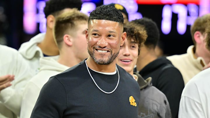 Feb 19, 2025; South Bend, Indiana, USA; Notre Dame head football coach Marcus Freeman and team are honored in the first half of the game between the Notre Dame Fighting Irish and the SMU Mustangs at the Purcell Pavilion.