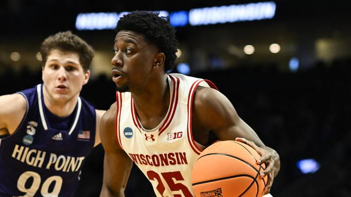 Mar 19, 2026; Portland, OR, USA; Wisconsin Badgers guard John Blackwell (25) drives to the basket against High Point Panthers guard Chase Johnston (99) during the second half of a first round game of the men's 2026 NCAA Tournament at Moda Center. Mandatory Credit: Troy Wayrynen-Imagn Images Mar 19, 2026; Portland, OR, USA; Wisconsin Badgers guard John Blackwell (25) drives to the basket against High Point Panthers guard Chase Johnston (99) during the second half of a first round game of the men's 2026 NCAA Tournament at Moda Center. Mandatory Credit: Troy Wayrynen-Imagn Images