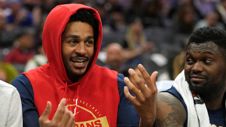 Apr 3, 2026; Sacramento, California, USA; New Orleans Pelicans guard Jordan Poole (center) talks with guard Dejounte Murray (left) and forward Zion Williamson (right) during the third quarter against the Sacramento Kings at Golden 1 Center. Mandatory Credit: Darren Yamashita-Imagn Images Apr 3, 2026; Sacramento, California, USA; New Orleans Pelicans guard Jordan Poole (center) talks with guard Dejounte Murray (left) and forward Zion Williamson (right) during the third quarter against the Sacramento Kings at Golden 1 Center. Mandatory Credit: Darren Yamashita-Imagn Images