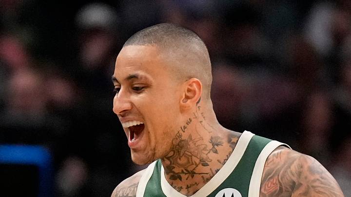 Milwaukee Bucks forward Kyle Kuzma (18) celebrates a play with guard Ryan Rollins (13) during the fourth quarter against the Cleveland Cavaliers at Fiserv Forum on February 25, 2026.
