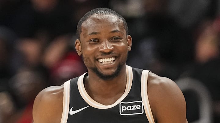 Atlanta Hawks forward Jonathan Kuminga (0) reacts after making a three point shot against the Washington Wizards during the first half at State Farm Arena on February 26, 2026.
