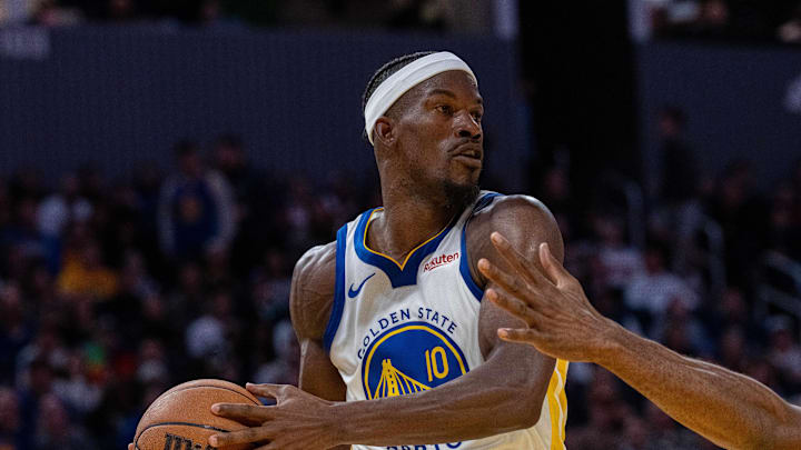 Oct 28, 2025; San Francisco, California, USA; Golden State Warriors forward Jimmy Butler III (10) passes the basket ball against LA Clippers forward Kawhi Leonard (2) during the fourth quarter at Chase Center. Mandatory Credit: Neville E. Guard-Imagn Images