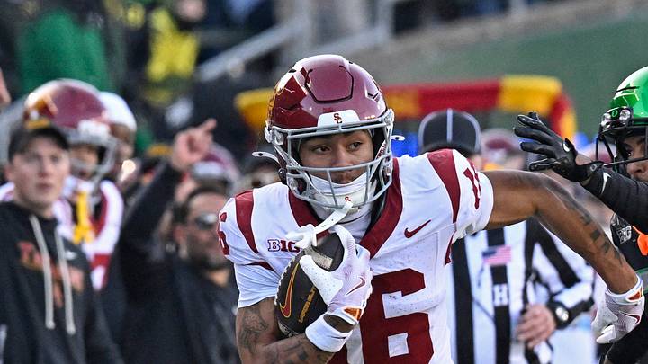 Nov 22, 2025; Eugene, Oregon, USA; Southern California Trojans wide receiver Tanook Hines (16) runs with the ball during the first half against the Oregon Ducks at Autzen Stadium. Nov 22, 2025; Eugene, Oregon, USA; Southern California Trojans wide receiver Tanook Hines (16) runs with the ball during the first half against the Oregon Ducks at Autzen Stadium.