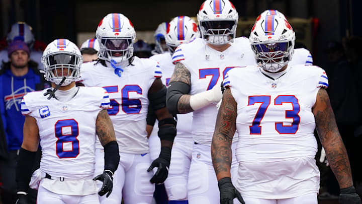 Buffalo Bills offensive tackle Dion Dawkins (73) and linebacker Terrel Bernard (8) warms up prior to the game against the Tampa Bay Buccaneers at Highmark Stadium. 