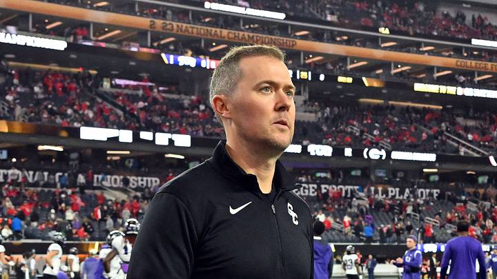 Southern California Trojans head coach Lincoln Riley walks the field before the CFP national championship game between the TCU Horned Frogs and the Georgia Bulldogs at SoFi Stadium.